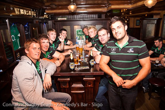 men at table drinking kennedys bar sligo